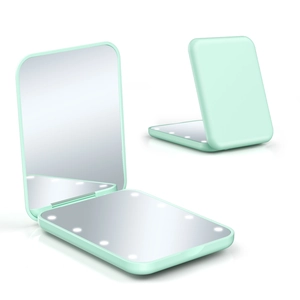 Compact mint green foldable LED makeup mirror showing open and closed positions