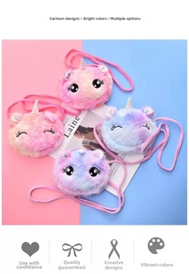 Macro shot of fluffy plush unicorn crossbody bags in pink and purple gradient colors