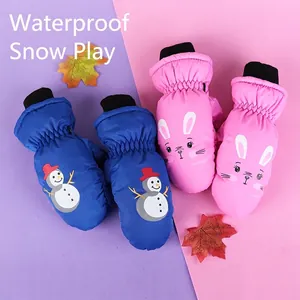 Waterproof winter ski mittens for kids aged 3-10 featuring cartoon snowman and rabbit prints