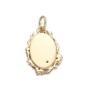 Golden oval pendant charm with leaf frame for DIY jewelry making on white background