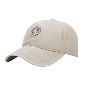 Vintage washed beige cotton baseball cap featuring sun embroidery and curved brim