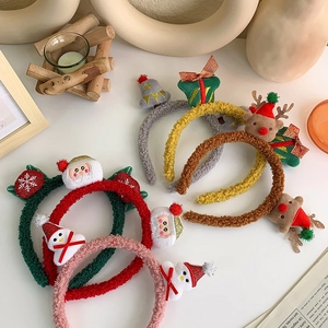Assorted plush Christmas headbands featuring Santa, reindeer, and snowman festive designs