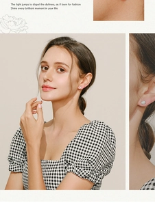 Close-up of rectangular opal studs on female model with elegant fashion lighting