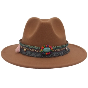 Detail of brown fedora hat with ethnic turquoise beaded band and colorful tassels
