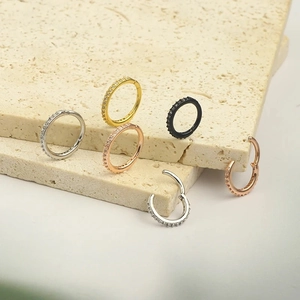 Hinged stainless steel nose rings with cubic zirconia in silver, gold, and black colors
