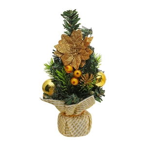 Mini artificial Christmas tree with gold flowers and berries on a striped fabric base