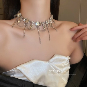 Elegant silver-tone choker necklace with rectangle crystals and sparkling diamond tassels