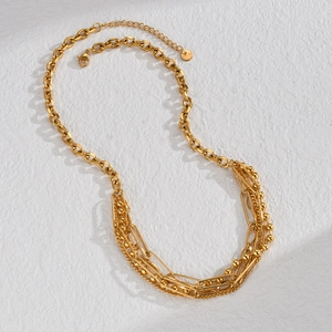 Vintage layered gold necklace in stainless steel with bead accents and mixed chain styles
