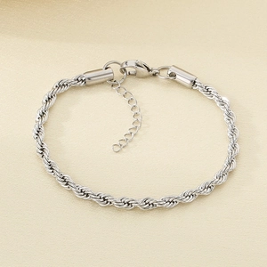 Detailed view of silver twisted rope chain bracelet with lobster clasp and extender
