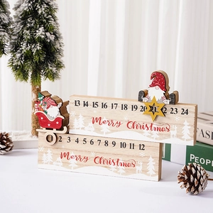 Christmas wooden countdown calendar with Santa sleigh and blocks on a festive background