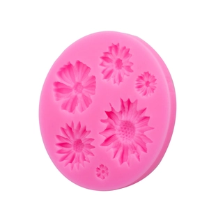 Pink sunflower silicone mold for fondant cake and baking with various flower shapes