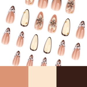 3D floral press-on nails with leopard French tips and cream-brown almond shaped design