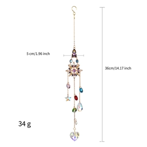Detail view of crystal suncatcher with sun and star metal frame and dimension markings