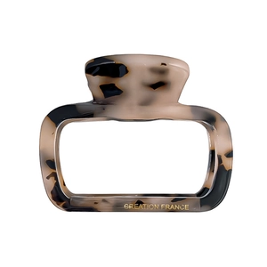 Large tortoiseshell acetate hair claw clip with Creation France gold lettering