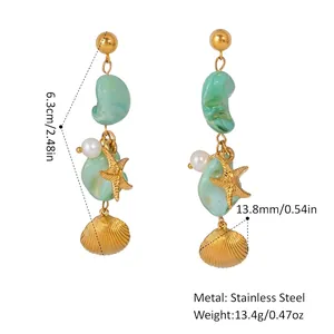 Detail of stainless steel earrings with pearl, starfish pendants and size markings