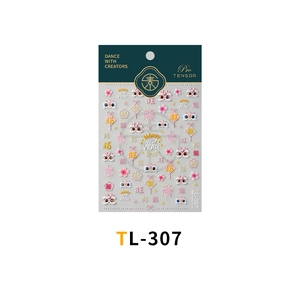 Detailed view of 5D embossed nail art stickers with Chinese New Year lion and floral patterns