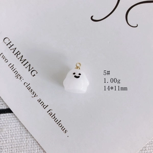 Detail view of a white acrylic ghost charm with dimensions and 1.00g weight info