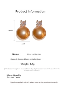 Detailed view of zircon pearl earrings showing 1.4x1cm size dimensions and gold base