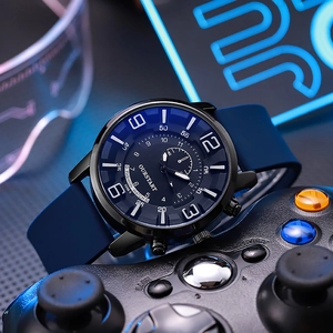 Macro detail of quartz watch with blue silicone strap on a neon gaming background