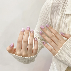 Handmade purple cat eye press-on nails with lavender gradients and gold floral patterns