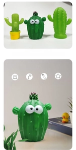 Detail showing cactus LED night lights for reading and nursing in a cozy home setting