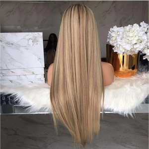 Rear view of long straight brown ombre synthetic wig with smooth texture on a model