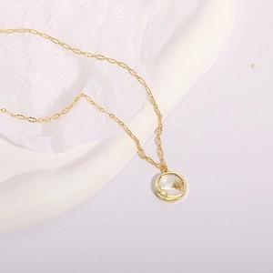 Minimalist 14K gold plated brass necklace with sparkling sun and moon star pendant