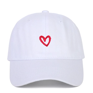 White cotton baseball cap with minimalist red embroidered heart on the front
