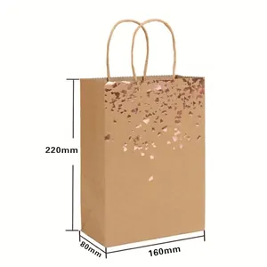 Brown kraft paper gift bag with rose gold foil stars and twine handles 22x16x8cm
