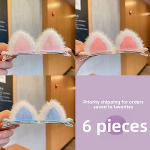 Detailed close-up of 6 pieces cute plush cat ear hair clips for girls in pink and blue