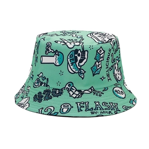 Double-sided mint green bucket hat with graffiti prints and flat top for outdoor sun protection