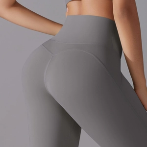 Detailed view of high-waist grey yoga pants with seamless V-shape stitching for butt lift