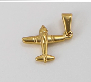 Detailed macro view of a 18K gold plated stainless steel airplane pendant with polished finish
