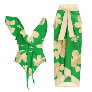 Tropical green one-shoulder bikini with matching floral print wrap skirt three-piece set