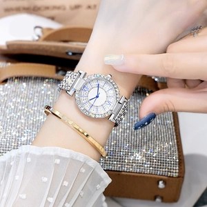 Luxury silver-tone women's quartz watch with full rhinestones and gold bracelet set