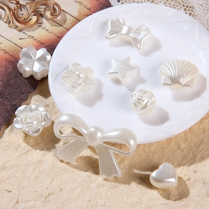 Assorted white baroque pearl beads in heart, flower and bow shapes for DIY jewelry making