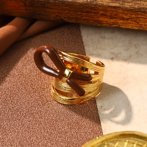French retro gold multilayer ring featuring a brown enamel bow and adjustable band