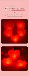 Macro detail of red heart-shaped LED lights with textured crystal surface for stage props