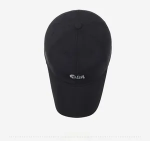 Top view of a black baseball cap featuring a lion head logo and structured six-panel design