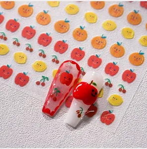 Detail of TK-015 fruit nail stickers with 3D red apple charms on glossy nail tips