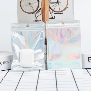 Holographic laser resealable bags for jewelry and accessories storage shown with earbuds