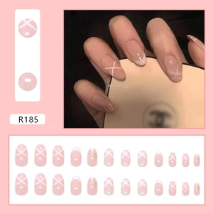 French tip press-on nails with sweet pink ribbon design and glitter accents 24pcs