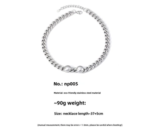 Detailed view of silver stainless steel Cuban link necklace with polished metal beads