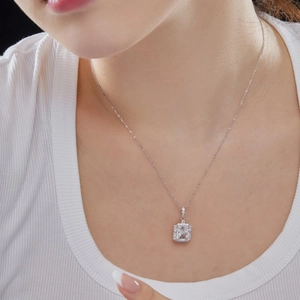 Elegant S925 sterling silver necklace with large rectangular zircon pendant on a model