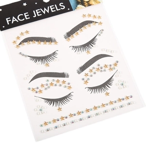 Face Jewels set with gold stars, pearls, and rhinestones for music festival parties