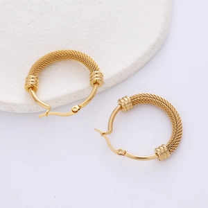 Golden mesh texture titanium steel hoop earrings with polished finish on white base