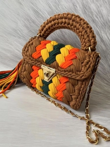 Handmade crochet striped handbag in brown knit with colorful flap and chain strap