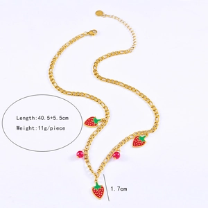 Detail of gold strawberry necklace with pink beads, measuring 40.5+5.5cm and 11g