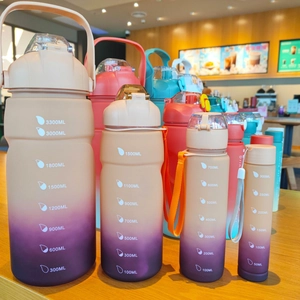 Detailed size comparison of four gradient frosted sport water bottles from 300ml to 3300ml