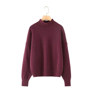 Women's wine red turtleneck sweater with drop shoulder knit design on a wooden hanger